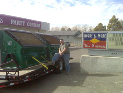 Brad of OMH ProScreen USA stops at Party Corner to show his topsoil screeners.
