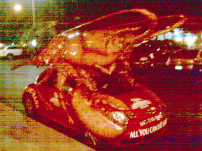 All You Can Eat Lobster eating a Volks Wagon Bug.