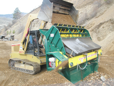 OMH ProScreen PVG-C96 being fed by skidsteer